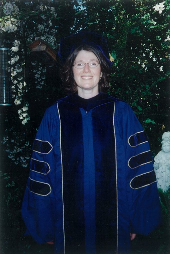 Laura Hathaway as a new doctoral graduate.